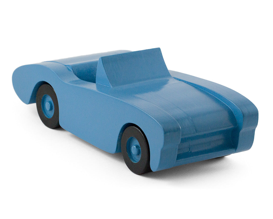 Handcrafted wooden toy car in blue